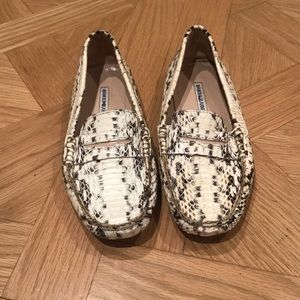 Manolo Blahnik white snakeskin loafer.